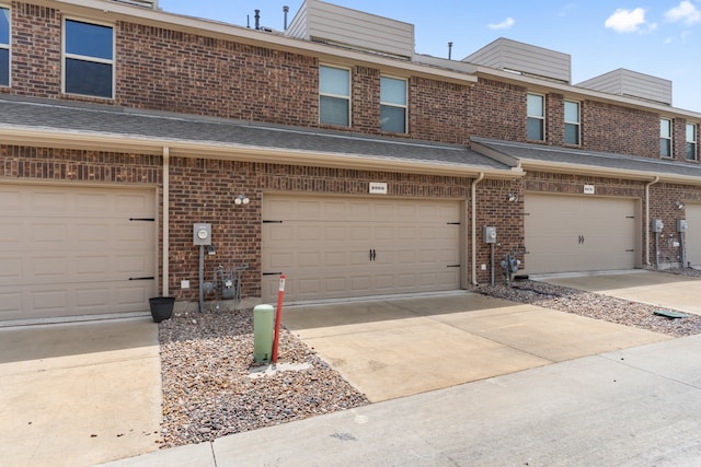 view of property with a garage