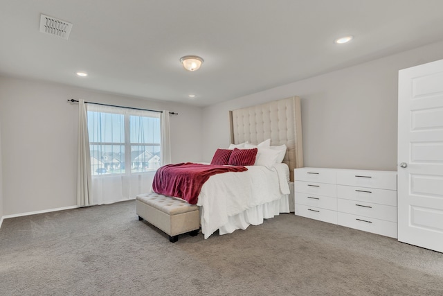 bedroom featuring carpet