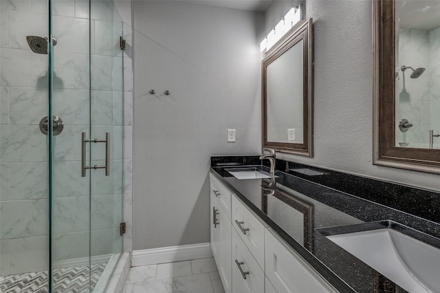 bathroom featuring vanity and walk in shower