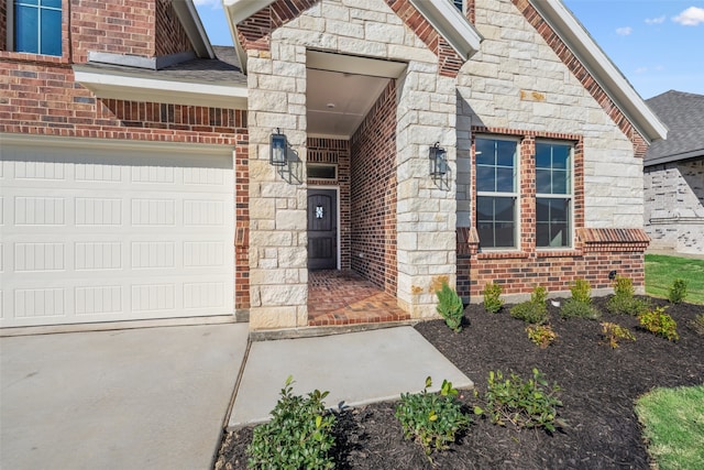 doorway to property featuring a garage