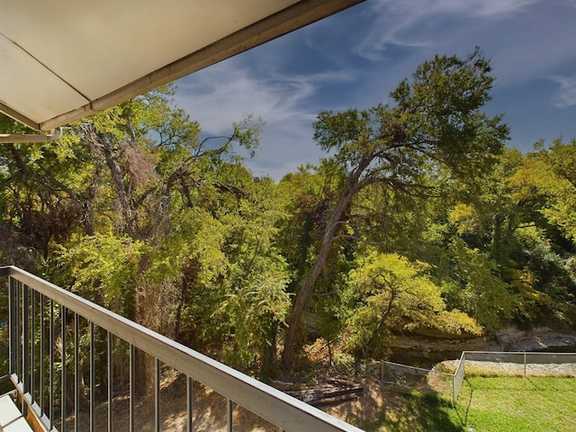 9747 Whitehurst Dr Unit 146, Dallas, TX 75243 - balcony with a forest view