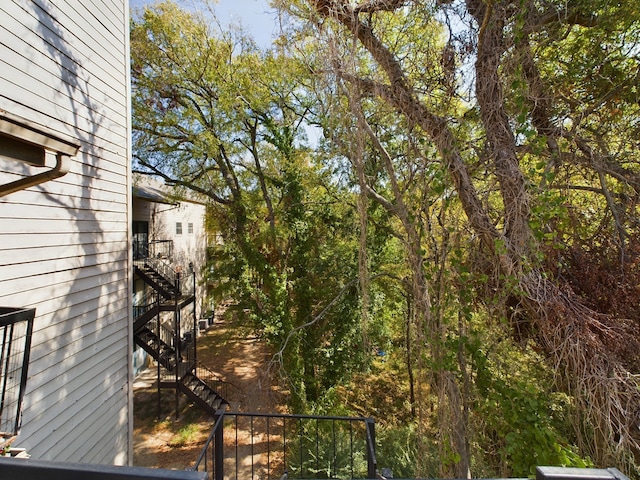 9747 Whitehurst Dr Unit 146, Dallas, TX 75243 - view of yard featuring stairway