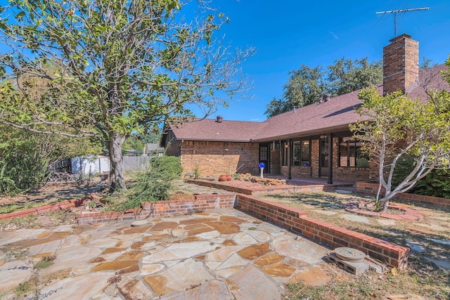 view of patio / terrace with a shed