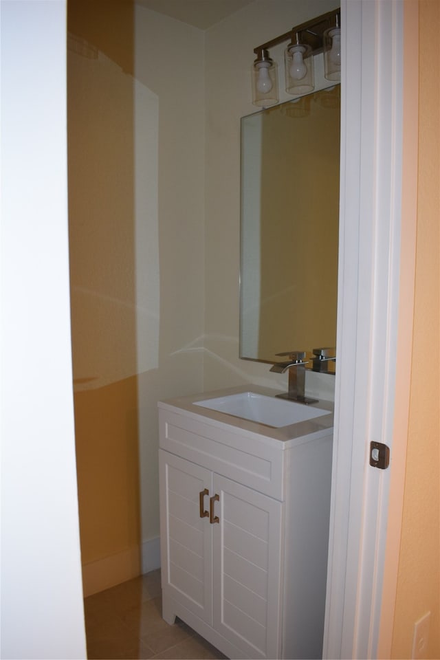 bathroom featuring vanity and tile patterned floors