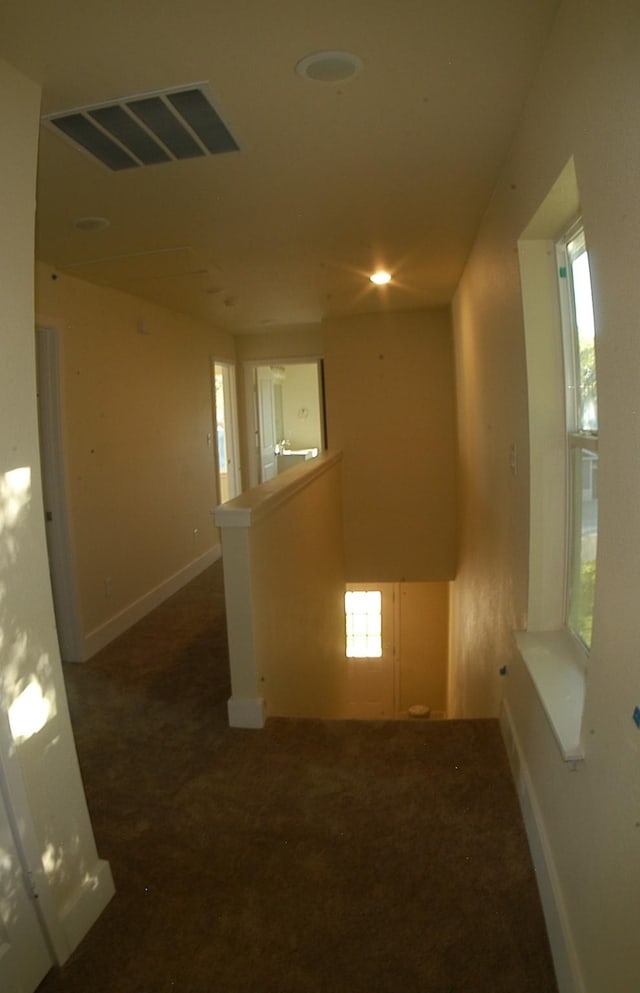 621 E Murray St, Denison, TX 75021 - carpeted spare room with visible vents and baseboards