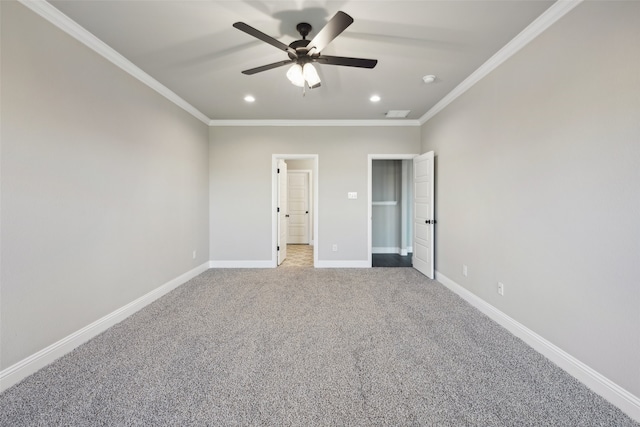 unfurnished bedroom with carpet flooring, ceiling fan, and crown molding