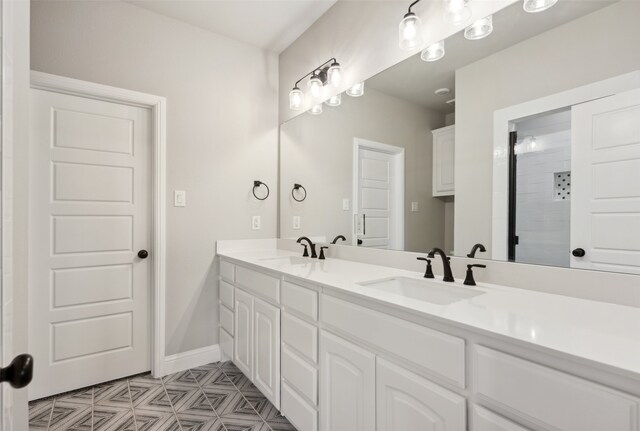 bathroom featuring vanity and walk in shower