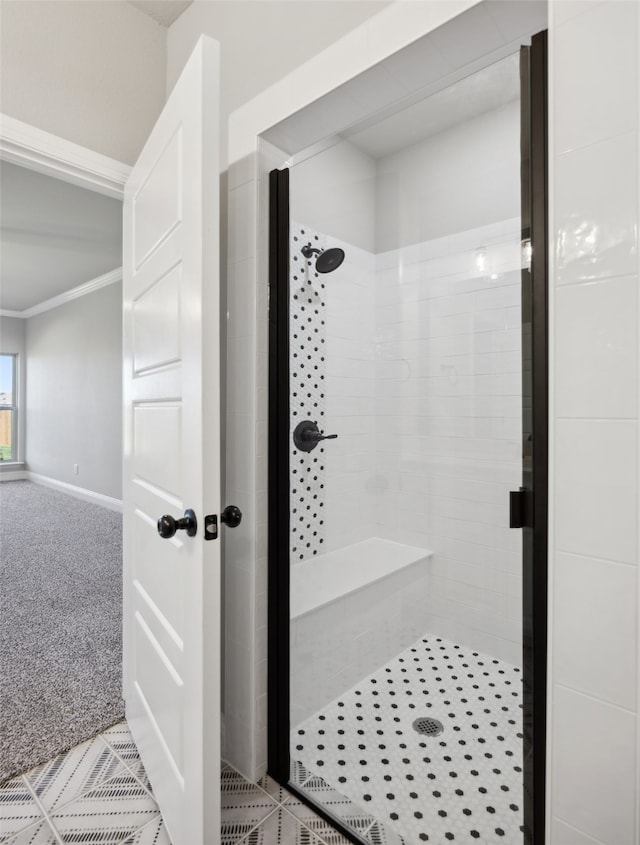 bathroom with tiled shower