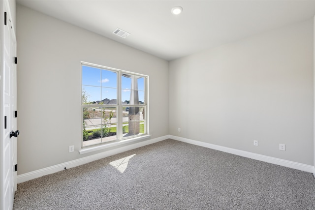 view of carpeted spare room