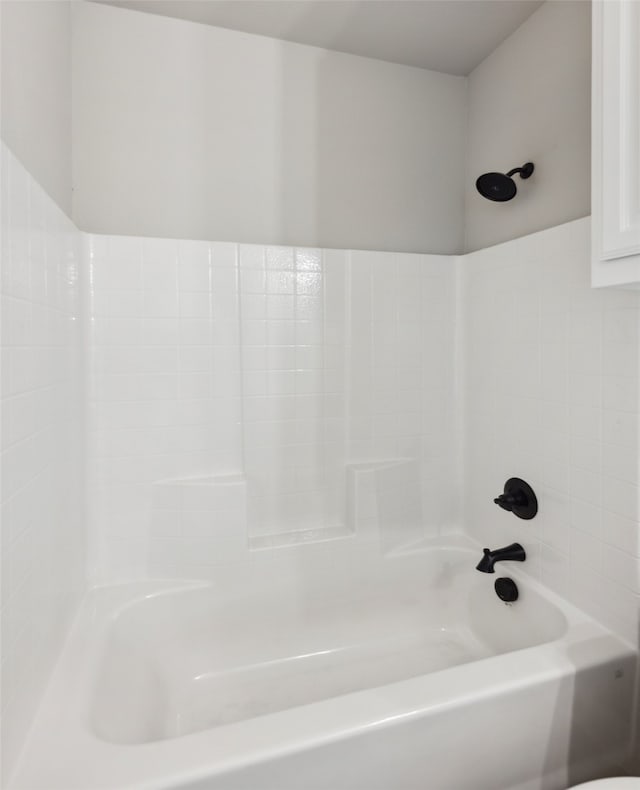 bathroom featuring washtub / shower combination