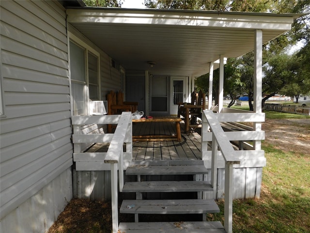 deck with covered porch