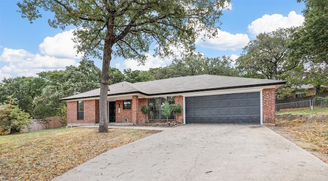 single story home with a garage