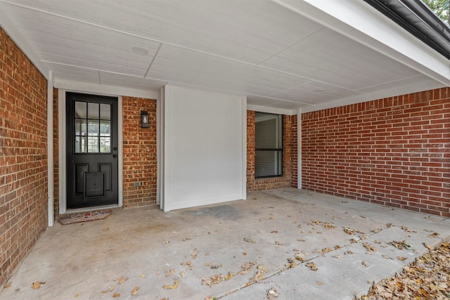 property entrance with a patio area