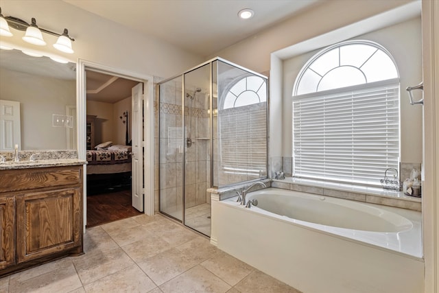 bathroom with vanity, separate shower and tub, and tile patterned flooring