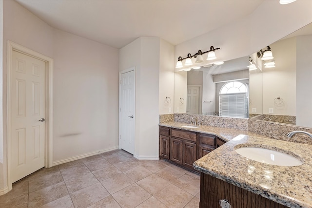 bathroom with vanity and tile patterned floors