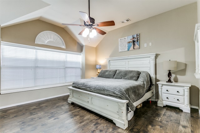 bedroom featuring lofted ceiling, dark wood-type flooring, and ceiling fan