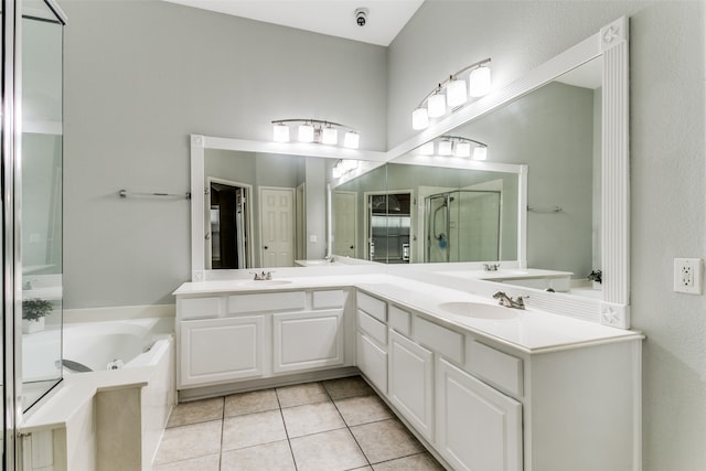 bathroom with vanity, separate shower and tub, and tile patterned flooring