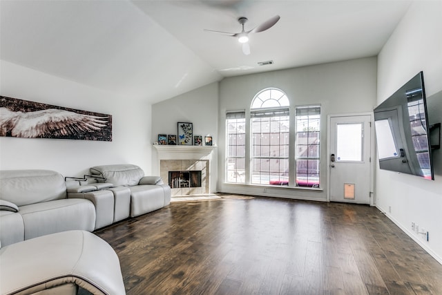 unfurnished living room with dark wood-type flooring, ceiling fan, and lofted ceiling