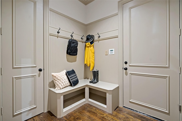 mudroom with dark wood-style floors