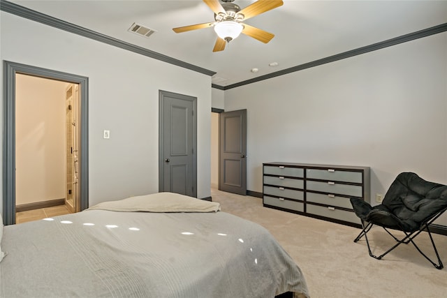 carpeted bedroom featuring ceiling fan and ornamental molding