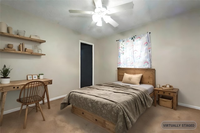 bedroom featuring ceiling fan and light colored carpet