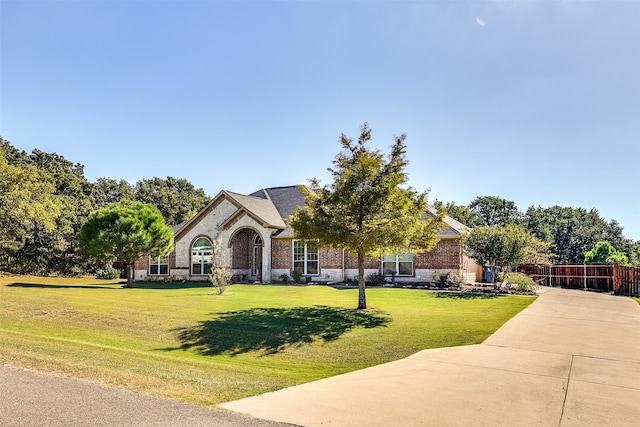 view of front of property with a front lawn