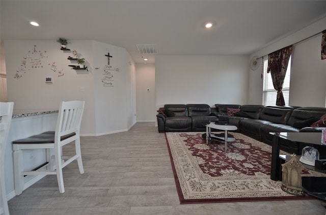 living room featuring light hardwood / wood-style floors