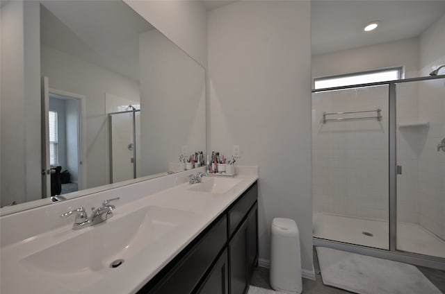 bathroom featuring vanity, an enclosed shower, and toilet