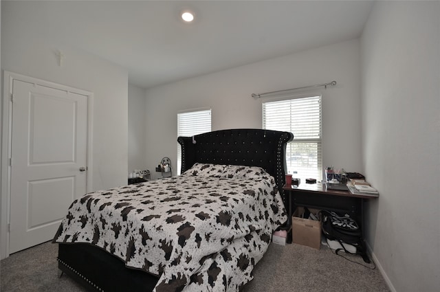 bedroom featuring carpet