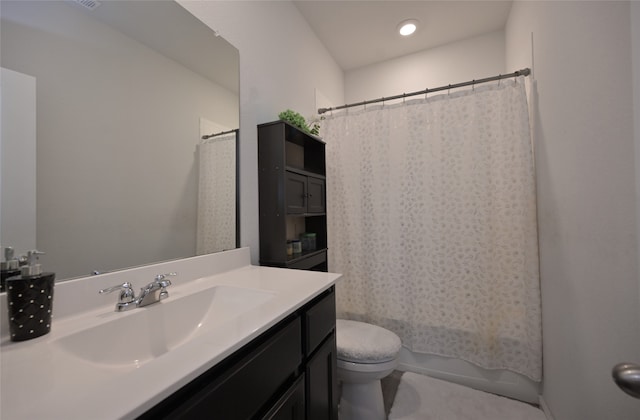 full bathroom featuring vanity, toilet, and shower / bath combo with shower curtain