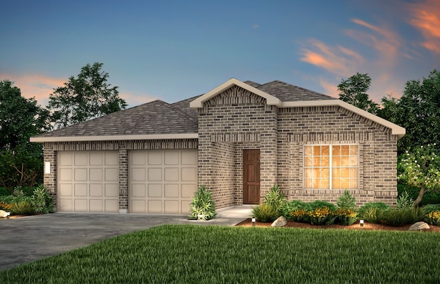 view of front of house with a lawn and a garage