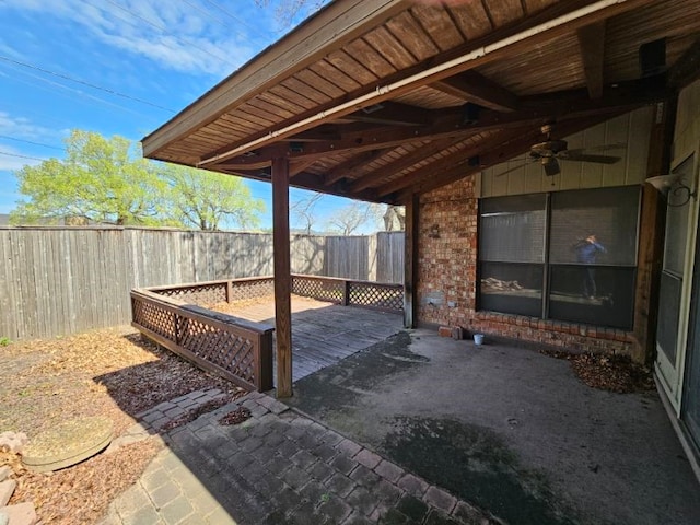 view of patio / terrace featuring ceiling fan and a deck