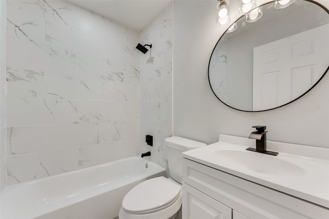 full bathroom with vanity, toilet, and tiled shower / bath