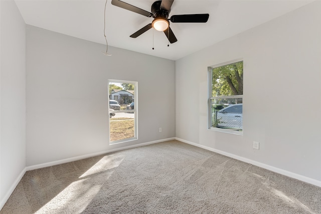 unfurnished room featuring carpet floors and ceiling fan