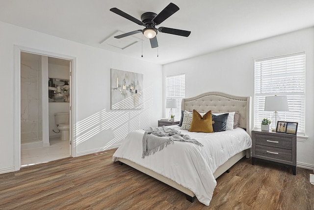 bedroom with ceiling fan, dark hardwood / wood-style floors, and connected bathroom