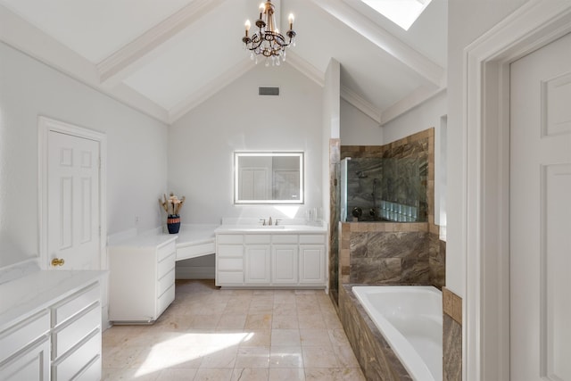 bathroom with plus walk in shower, vaulted ceiling with skylight, vanity, crown molding, and an inviting chandelier