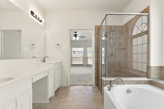 bathroom featuring vanity, independent shower and bath, ceiling fan, and tile patterned floors