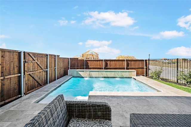 view of pool with pool water feature