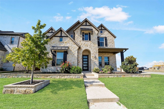 view of front of home with a front lawn