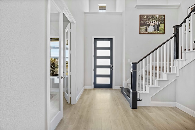 foyer featuring light hardwood / wood-style floors