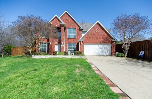 view of front of property with a front yard and a garage