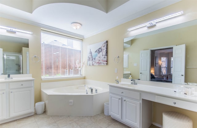 bathroom featuring vanity, independent shower and bath, ornamental molding, and tile patterned floors