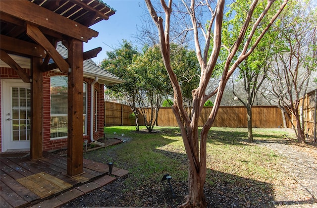 view of yard with a deck