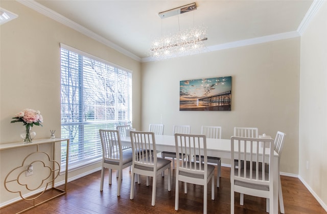 dining area with crown molding, a notable chandelier, and dark hardwood / wood-style floors