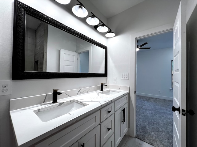 bathroom featuring vanity and ceiling fan