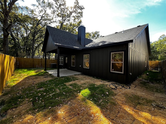 back of property with a patio area