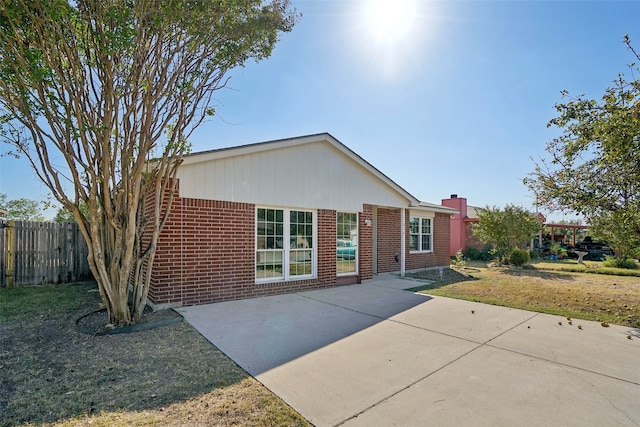 view of front of property with a patio