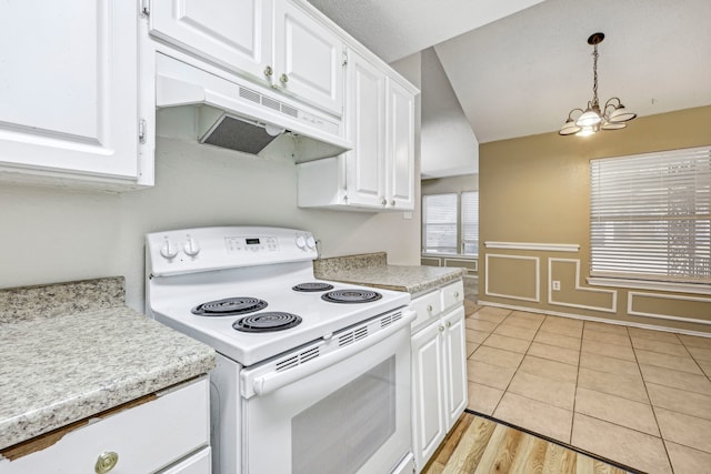 kitchen with white cabinets, hanging light fixtures, a notable chandelier, and white range with electric cooktop