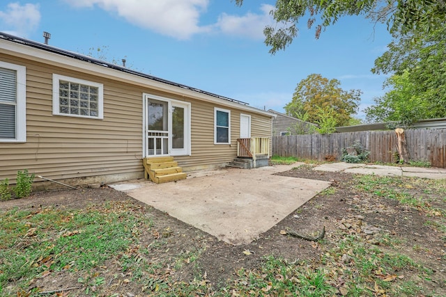 rear view of property with a patio