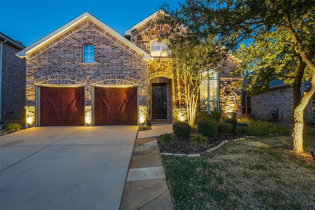 front of property featuring a garage